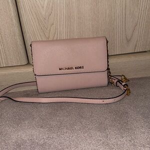 Michael Kors pink shoulder bag with double compartments. Gently used.